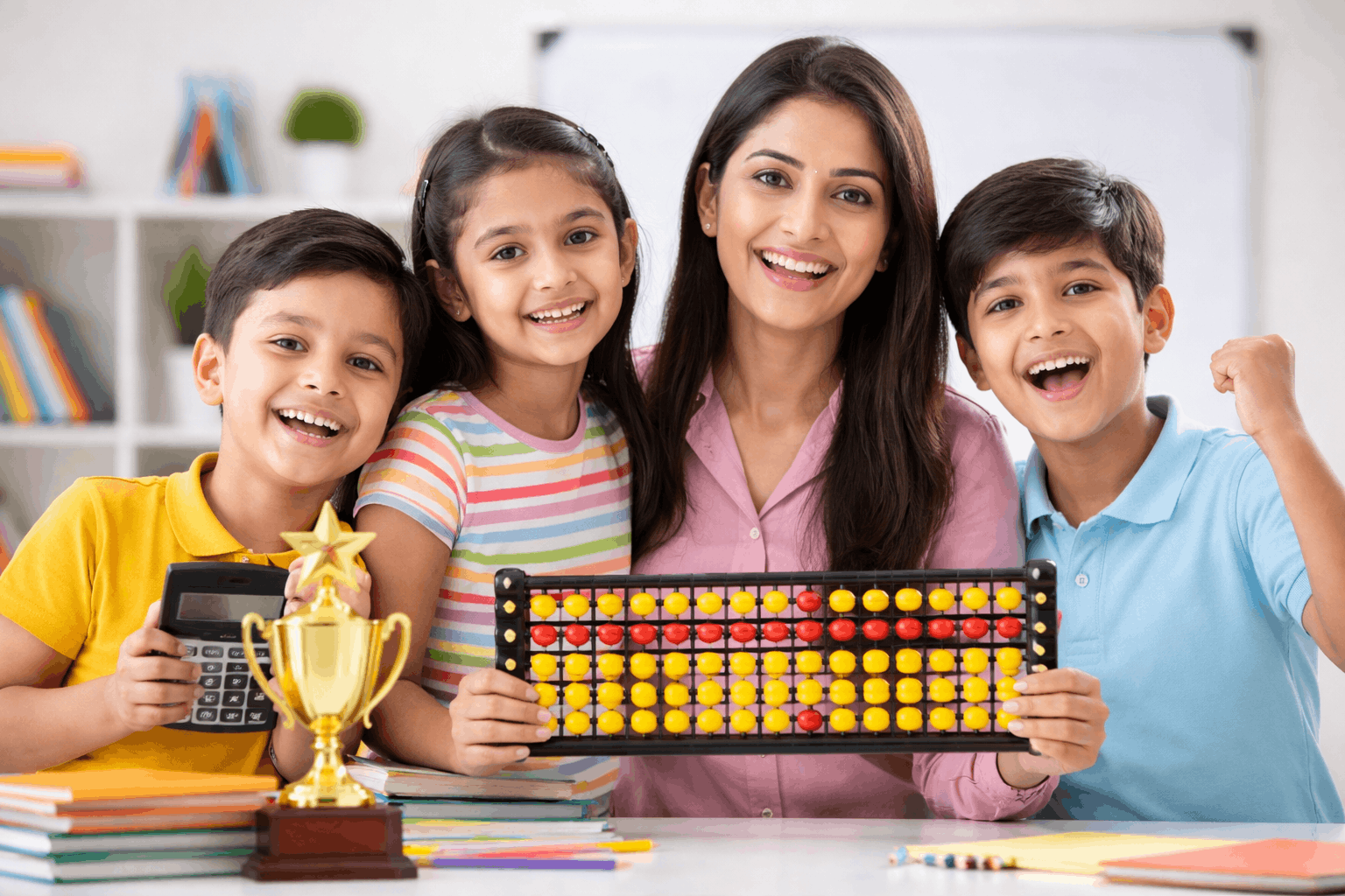 Abacus teacher guiding students in mental math learning using abacus